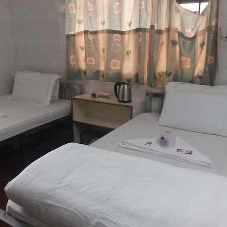 New Yan Yan Guest House Reception 9Th Floor Flat E4 E6 Hongkong Exteriör bild