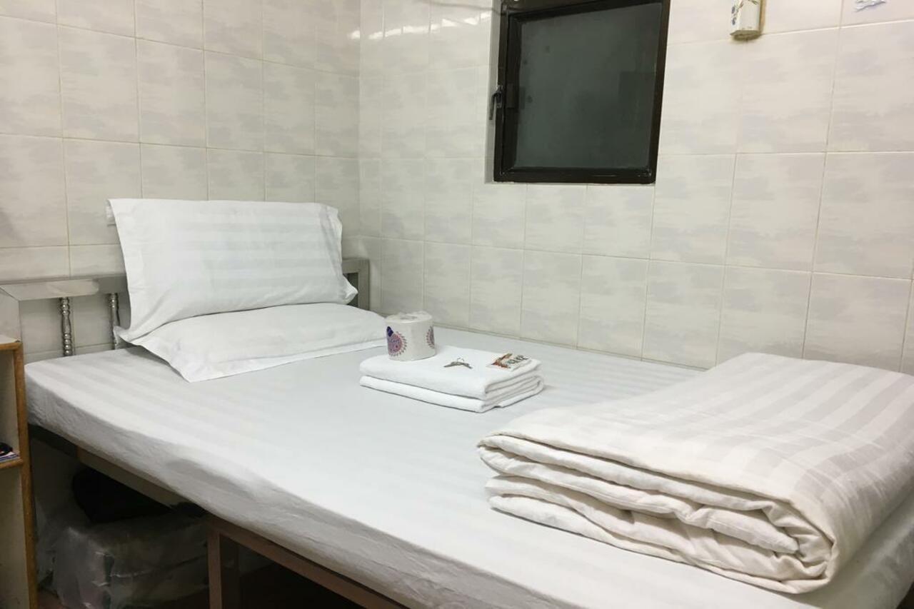 New Yan Yan Guest House Reception 9Th Floor Flat E4 E6 Hongkong Exteriör bild