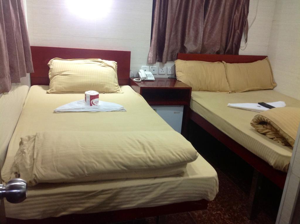 New Yan Yan Guest House Reception 9Th Floor Flat E4 E6 Hongkong Exteriör bild