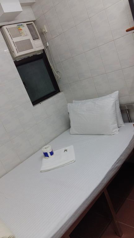 New Yan Yan Guest House Reception 9Th Floor Flat E4 E6 Hongkong Exteriör bild